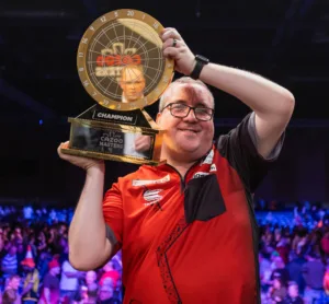 Stephen Bunting lifts the PDC Masters trophy having won his first PDC major