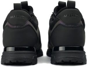 Mallet trainers are now seen regularly on stage at the darts Nathan Aspinall is one of many darts stars using Mallet trainers on stage